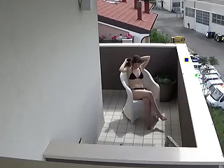 Spying my teen neighbour masturbating on her balcony